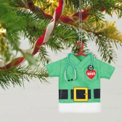 Hallmark The Gift Of Caring 2023 Fabric Ornament -Hallmark Gift Shop Green Scrubs Shirt Keepsake Ornament 1399QGO2897 02
