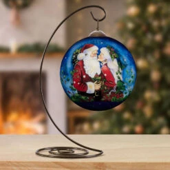 Ne'Qwa Art Merry Kiss-Mas Santa And Mrs. Claus Glass Christmas Ornament -Hallmark Gift Shop Santa and Mrs. Claus Kissing Blown Glass Ornament 7251104 04