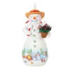 Hallmark Snowtop Lodge Terran S. Gardner Porcelain Ornament -Hallmark Gift Shop Snowman with Flower Pot Keepsake Ornament 2299QXR8119 01
